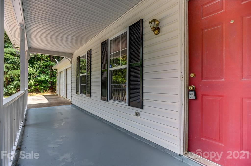 239 Valleyview Road Mooresville, NC 28117 - Photo 4 of 41 a view of a house with a porch