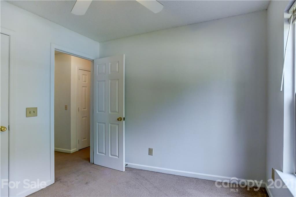 239 Valleyview Road Mooresville, NC 28117 - Photo 32 of 41 an empty room with closet area
