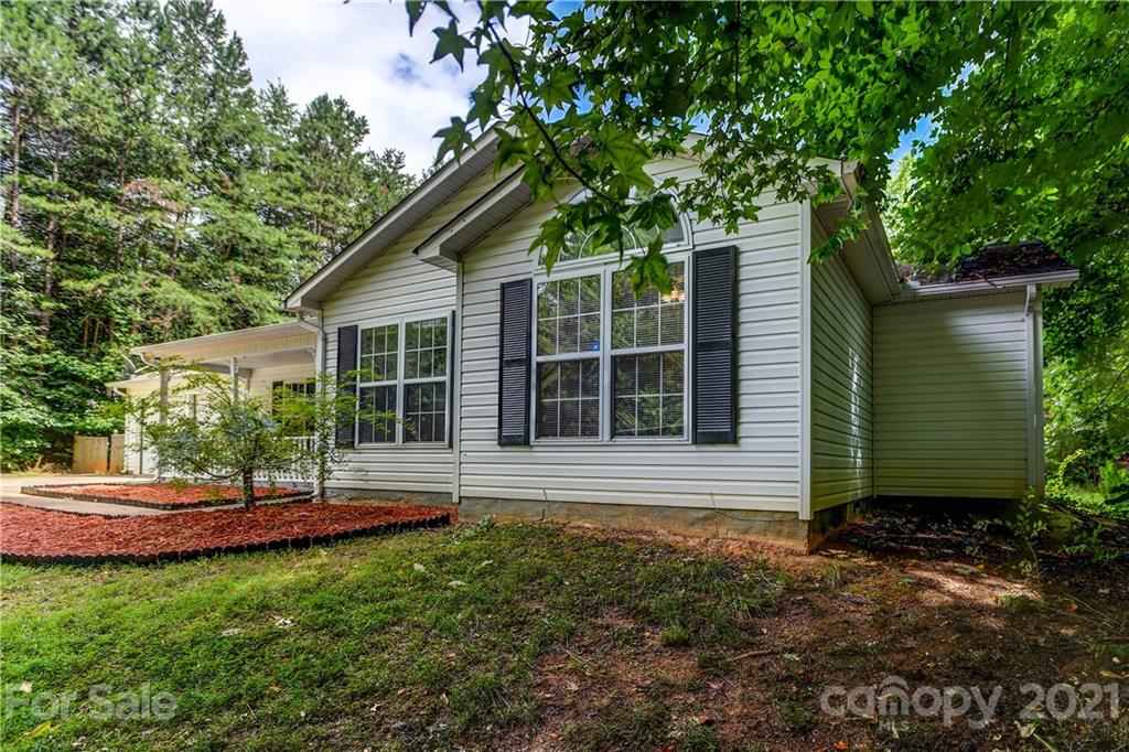 239 Valleyview Road Mooresville, NC 28117 - Photo 39 of 41 a house view with a garden space