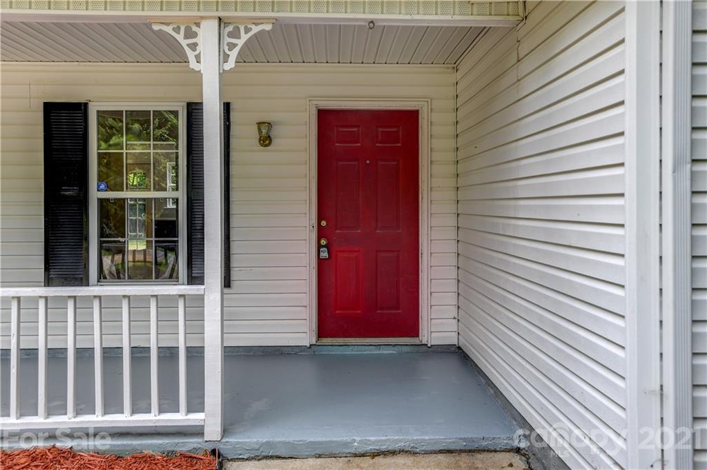239 Valleyview Road Mooresville, NC 28117 - Photo 5 of 41 a view of a red door of the house