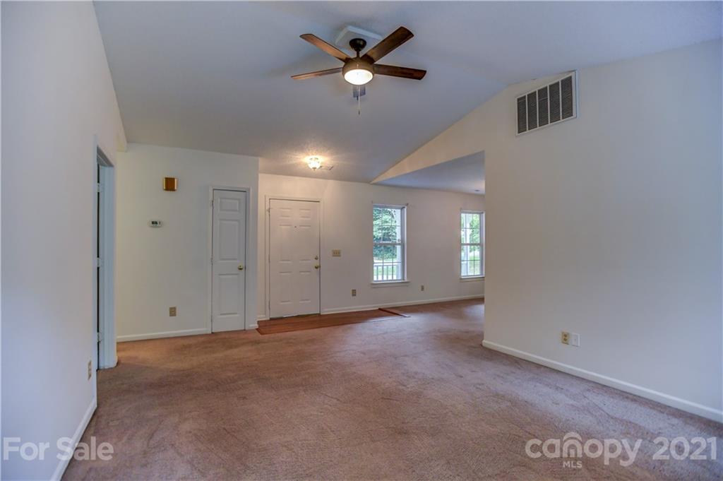 239 Valleyview Road Mooresville, NC 28117 - Photo 8 of 41 a view of an empty room