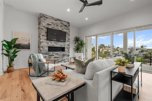 a large kitchen with stainless steel appliances lots of counter space and a sink