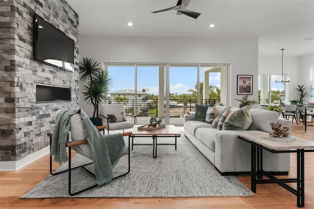 a kitchen with stainless steel appliances granite countertop a stove and a microwave