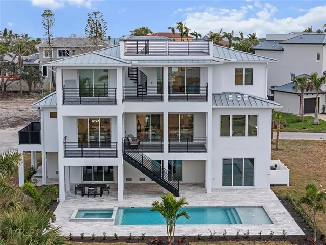 a view of a brick building next to a yard