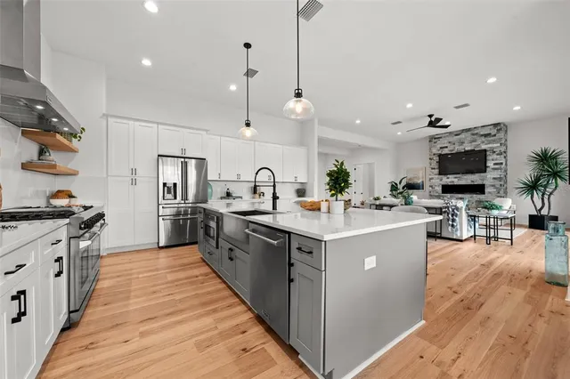 a bedroom with a bed and a potted plant