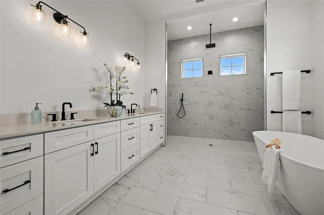 an aerial view of a house with outdoor space