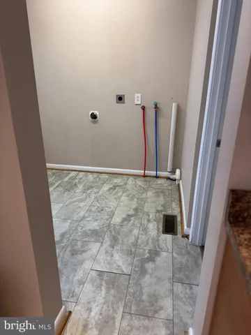 a view of wooden floor with a sink