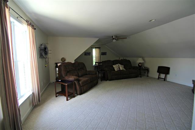 87 Oak Hollow Road Manchester, TN 37355 - Photo 14 of 18 Over-sized bonus room would make great media room.
