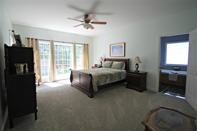 87 Oak Hollow Road Manchester, TN 37355 - Photo 9 of 18 Large master with lots of natural light. New carpet in master. Walk-in closet in master.