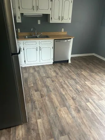 a view of a kitchen with a sink