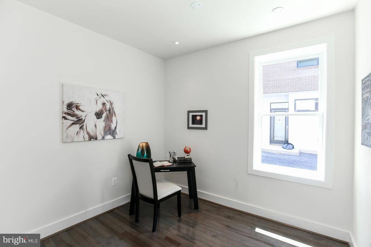 460 Ridge Street Northwest, Unit 1 Washington, DC 20001 - Photo 20 of 28 a view of a livingroom with a window