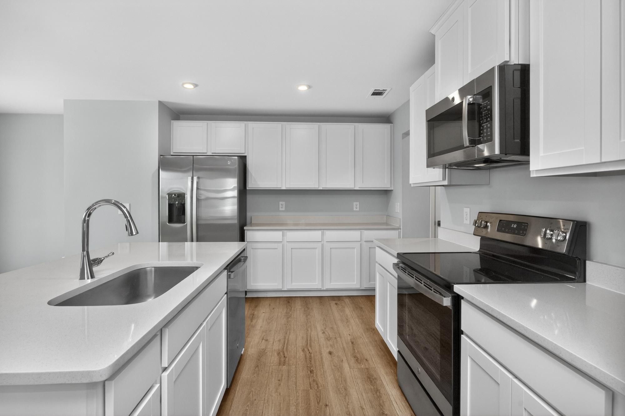 3004 Red Fox Ridge Madison, TN 37115 - Photo 18 of 45 a kitchen that has a sink and a stove top oven