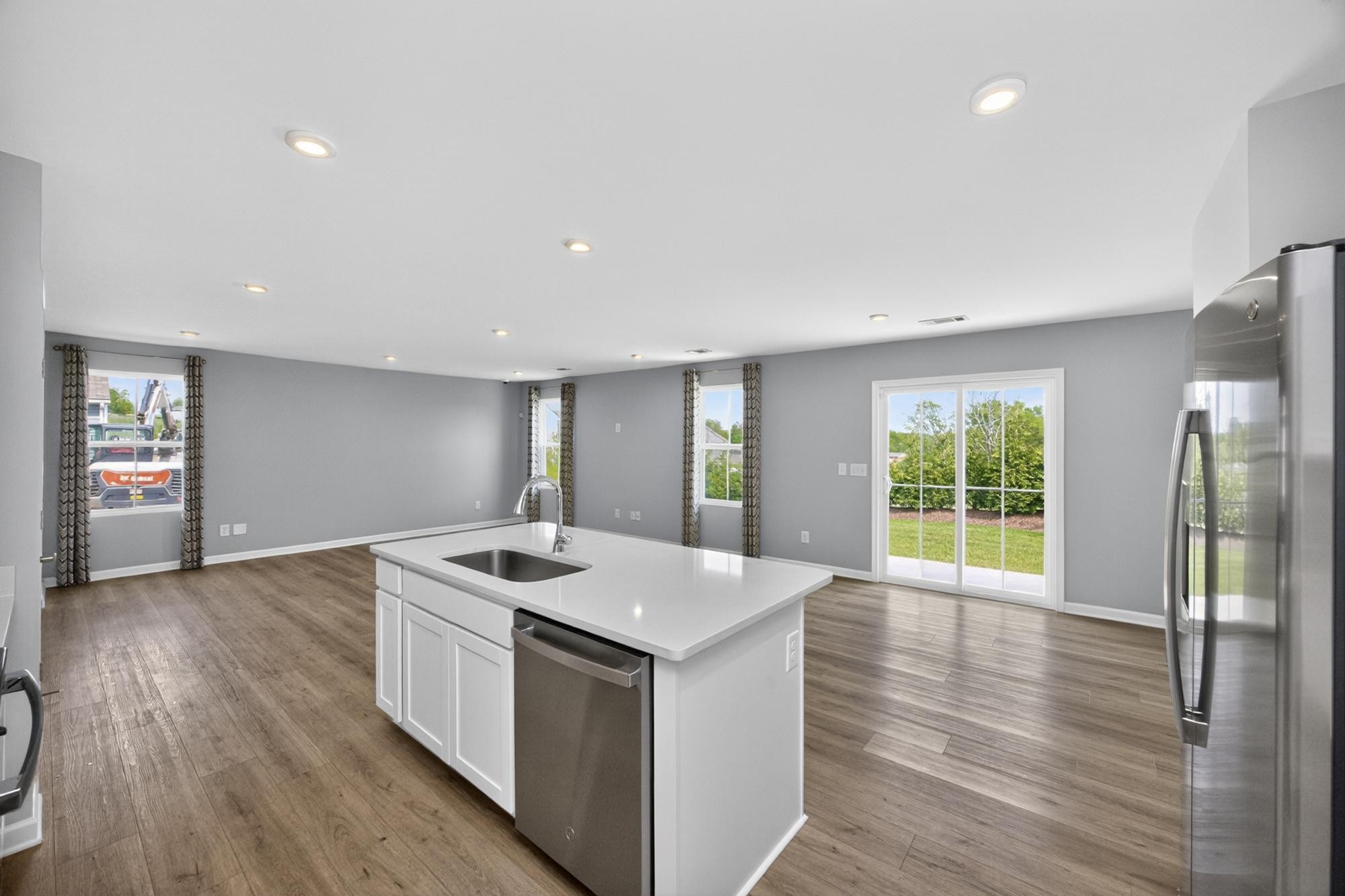 3004 Red Fox Ridge Madison, TN 37115 - Photo 20 of 45 a kitchen that has a sink and a wooden floor