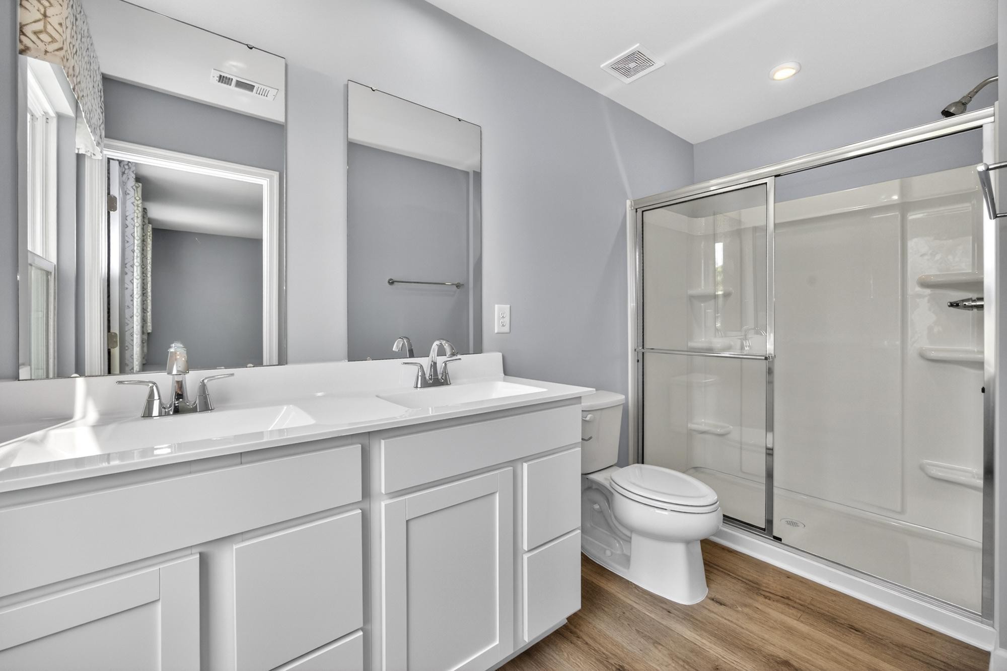 3004 Red Fox Ridge Madison, TN 37115 - Photo 30 of 45 a bathroom with a double vanity sink toilet and shower