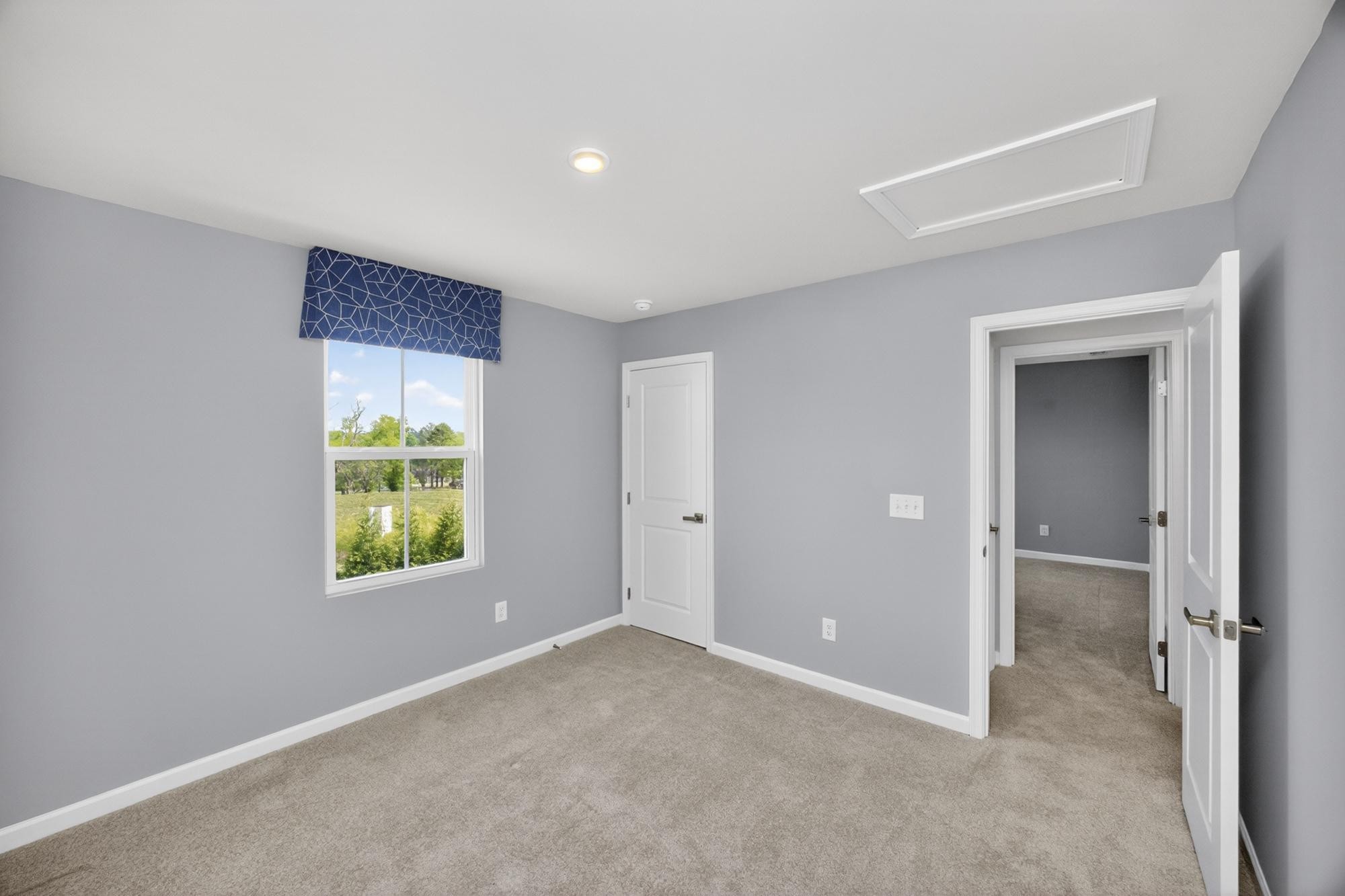 3004 Red Fox Ridge Madison, TN 37115 - Photo 39 of 45 an empty room with windows and with wooden door