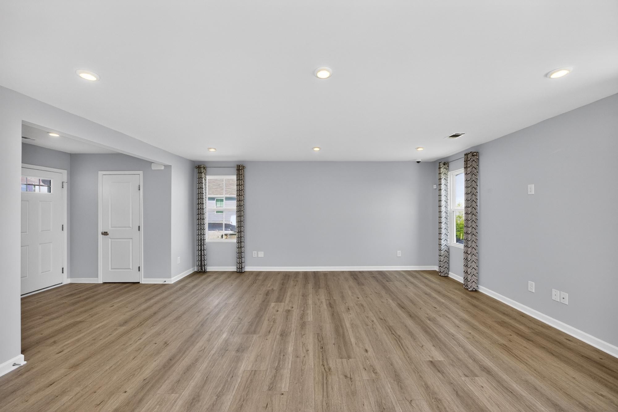 3004 Red Fox Ridge Madison, TN 37115 - Photo 7 of 45 a view of an empty room with wooden floor and closet