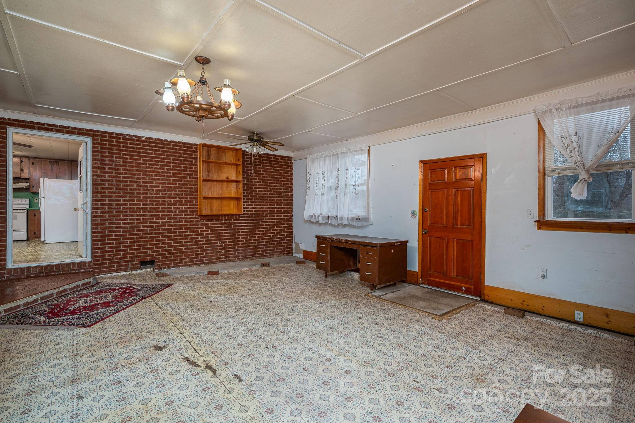 6331 Smith Road Vale, NC 28168 - Photo 18 of 33 a view of an empty room with a window