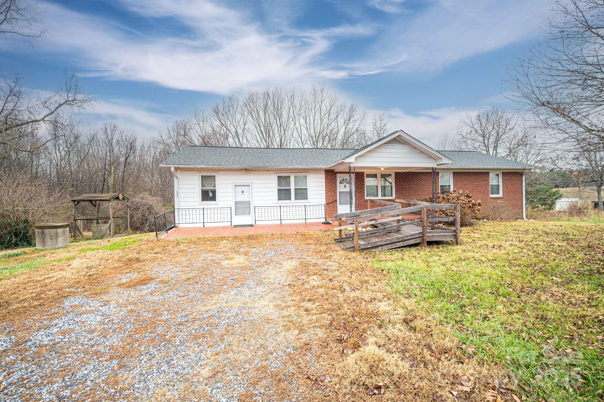6331 Smith Road Vale, NC 28168 - Photo 2 of 33 a house with swimming pool in front of it