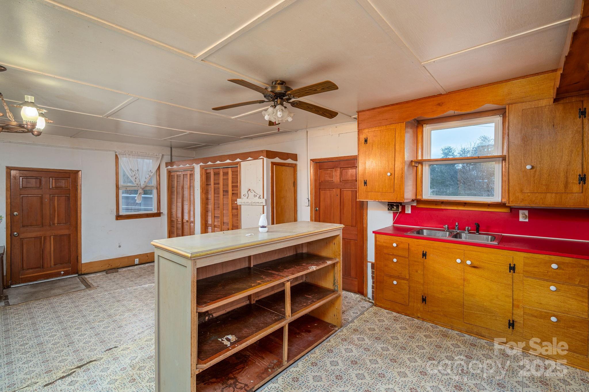 6331 Smith Road Vale, NC 28168 - Photo 23 of 33 a room with wooden floor and window