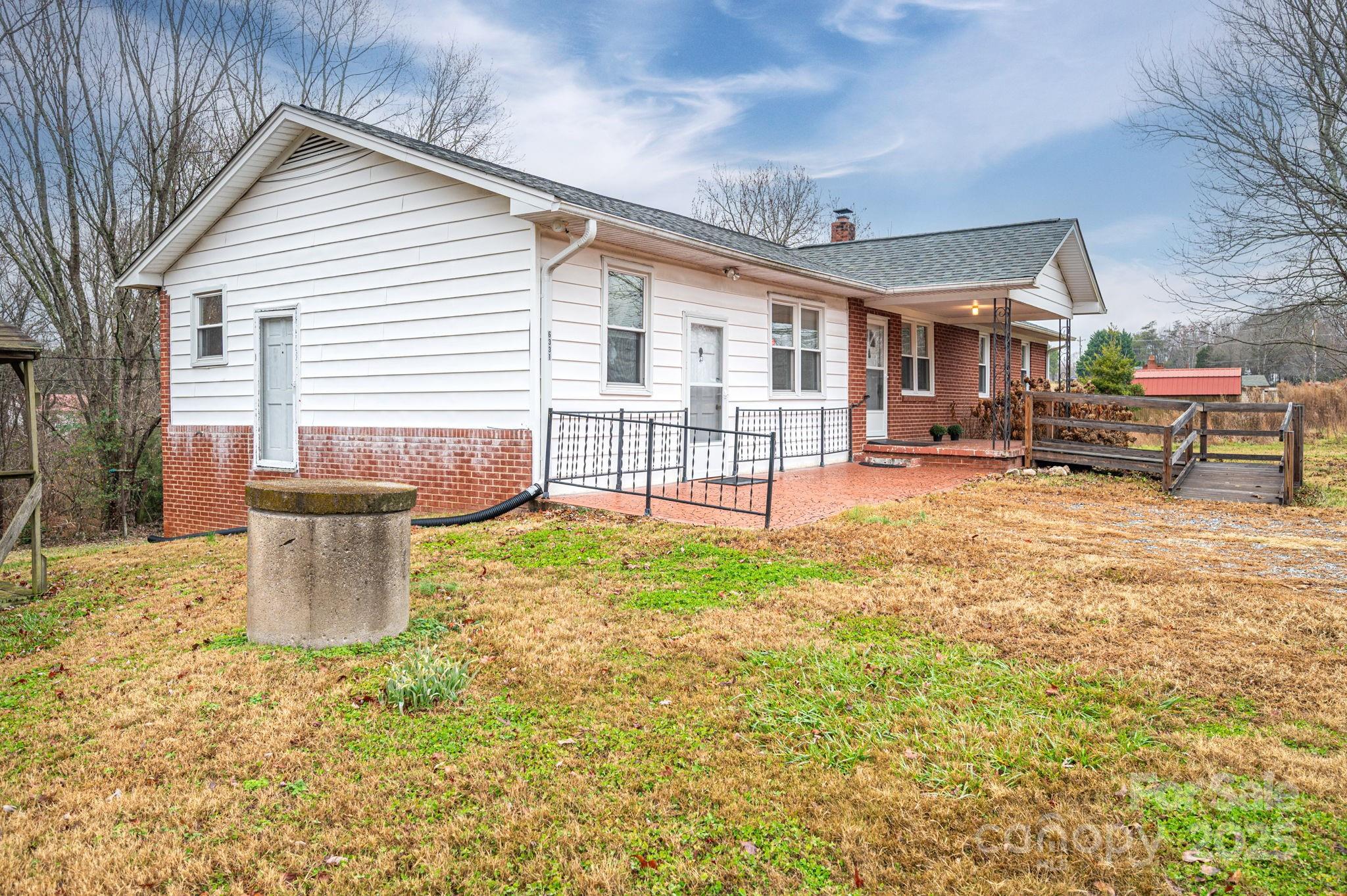 6331 Smith Road Vale, NC 28168 - Photo 3 of 33 a front view of a house with a yard