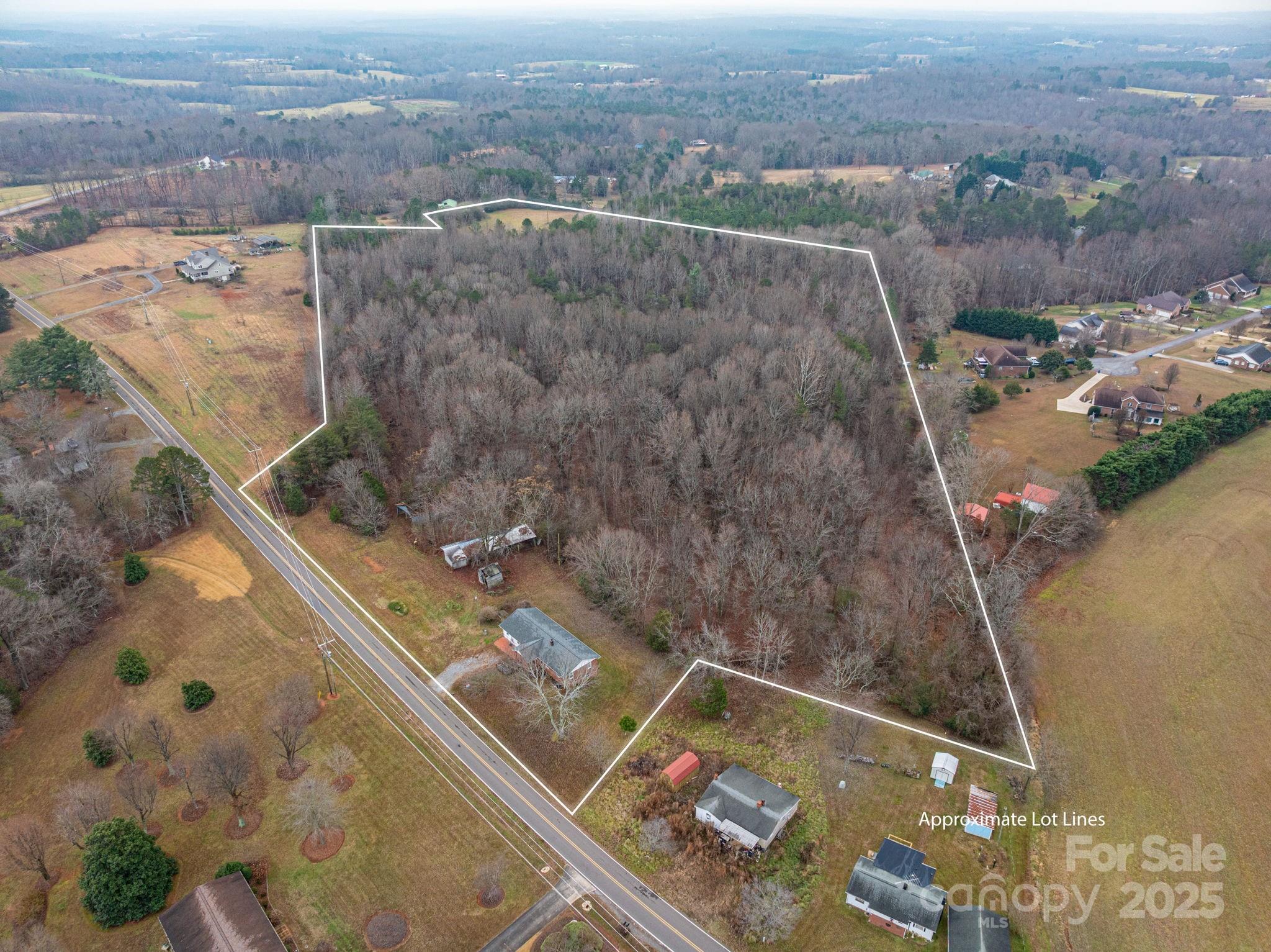 6331 Smith Road Vale, NC 28168 - Photo 33 of 33 an aerial view of residential houses with outdoor space