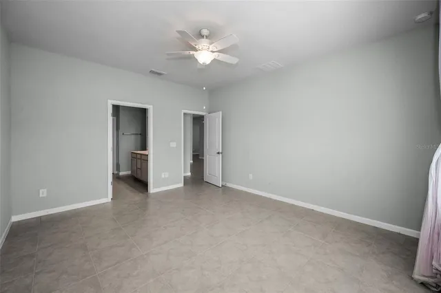 an empty room with a bathroom