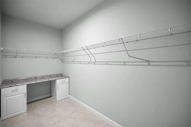 a view of a room with racks on the wall