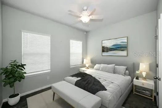 a bedroom with a large bed and a window