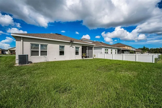 a view of a golf course with a lake