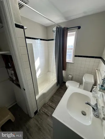 a bathroom with sink and mirror