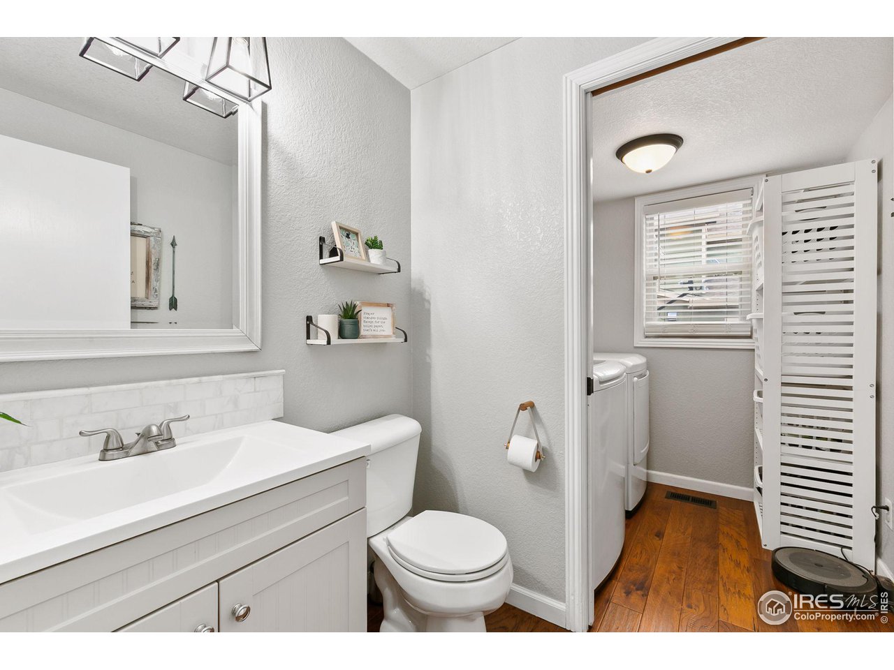 7204 West 23rd Road Greeley, CO 80634 - Photo 11 of 27 Main Floor Bathroom & Laundry