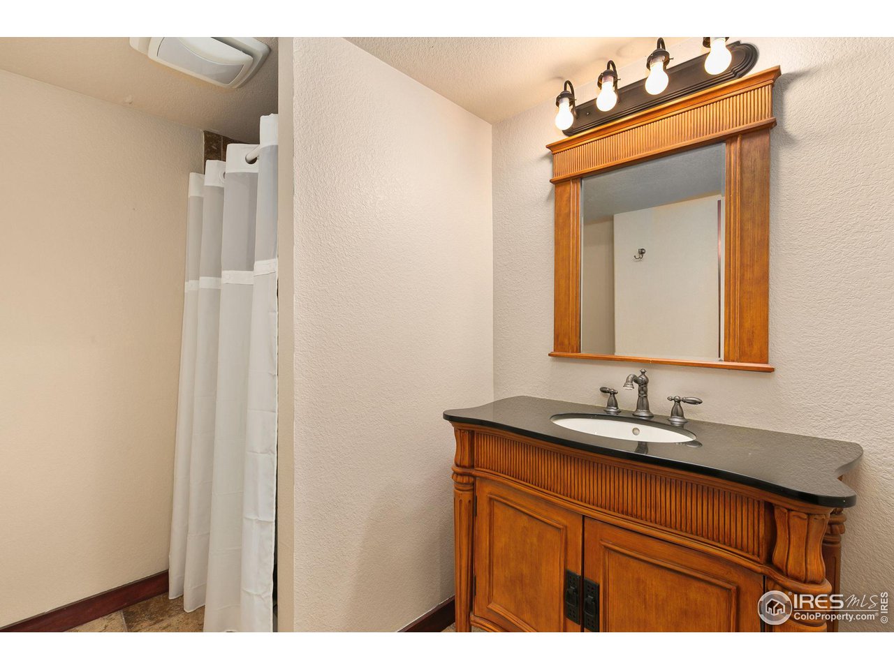 7204 West 23rd Road Greeley, CO 80634 - Photo 23 of 27 Basement Bathroom w/ Shower