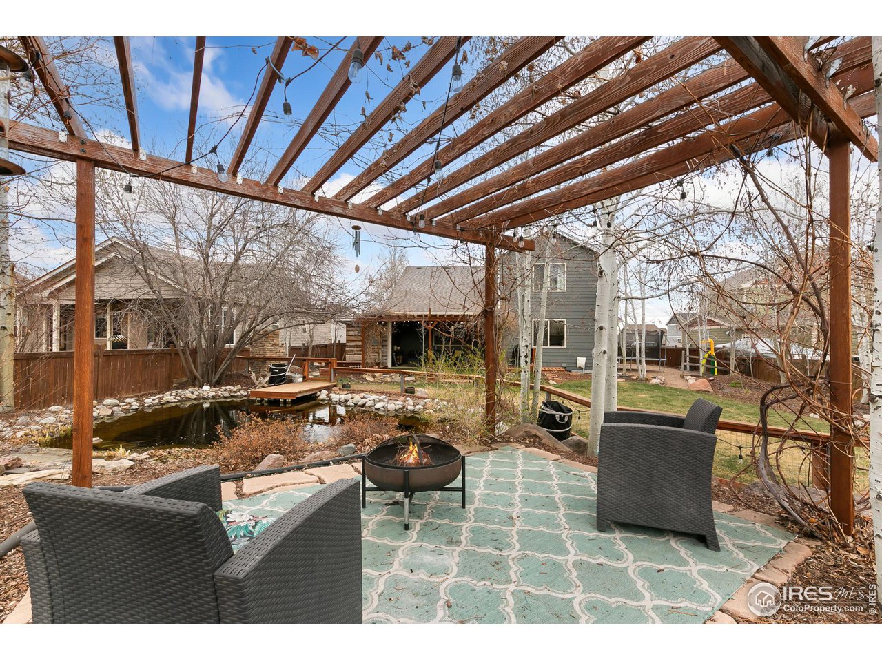 7204 West 23rd Road Greeley, CO 80634 - Photo 25 of 27 Additional Seating above the Koi Pond