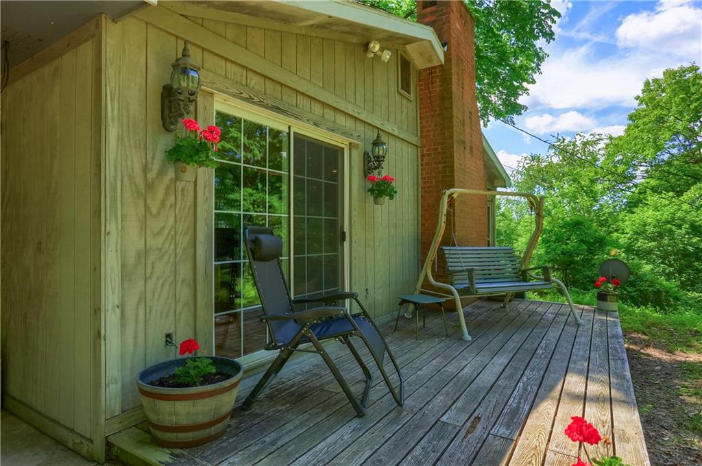 149 Seneca School Road Harmony, PA 16037 - Photo 35 of 50 Cozy deck accessible from the dining area. Enjoy the sounds of nature.