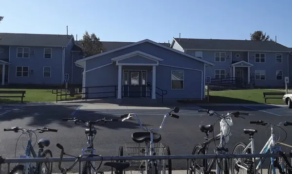 a view of a house with backyard