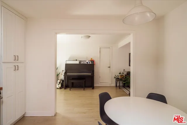 a room with furniture and wooden floor