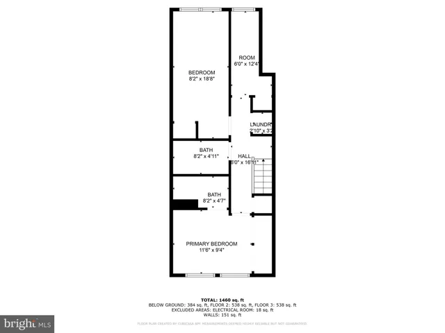 a picture of a bench in front of a wall