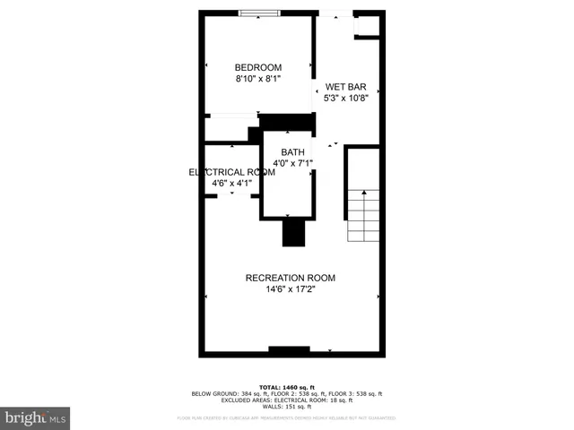 a picture of a bench in front of a wall