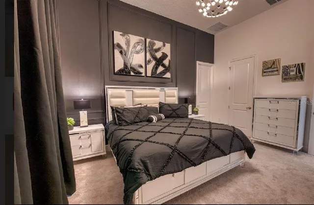 a bathroom with a sink a toilet and shower curtain