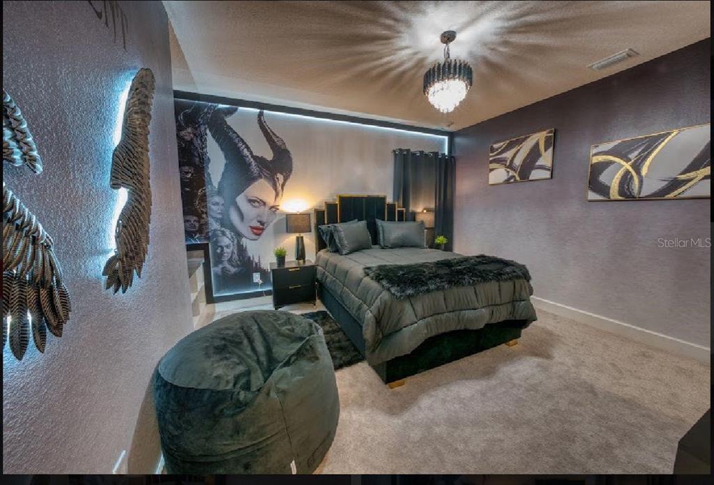 6301 Sand Skipper Road Orlando, FL 32821 - Photo 50 of 80 a living room with furniture and a rug