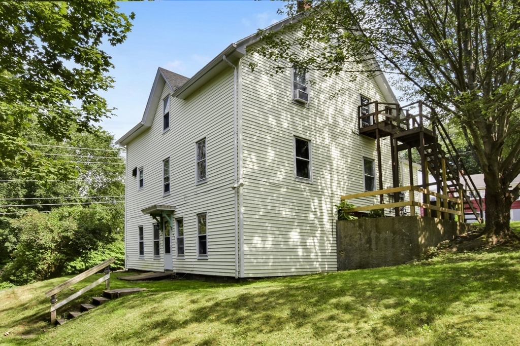 27-29 Allen Street Gardner, MA 01440 - Photo 18 of 30 a view of a house with a yard