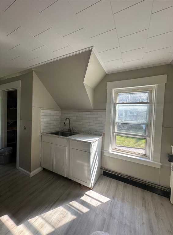27-29 Allen Street Gardner, MA 01440 - Photo 19 of 30 a kitchen with stainless steel appliances granite countertop a sink and a stove