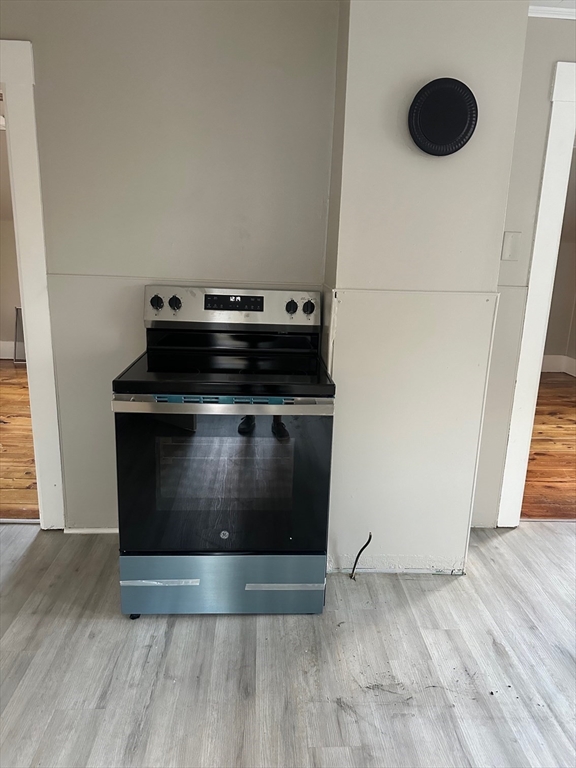 27-29 Allen Street Gardner, MA 01440 - Photo 20 of 30 a view of an empty room with wooden floor