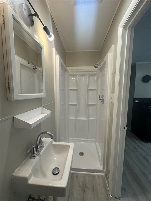 27-29 Allen Street Gardner, MA 01440 - Photo 23 of 30 a bathroom with a sink a shower and a mirror