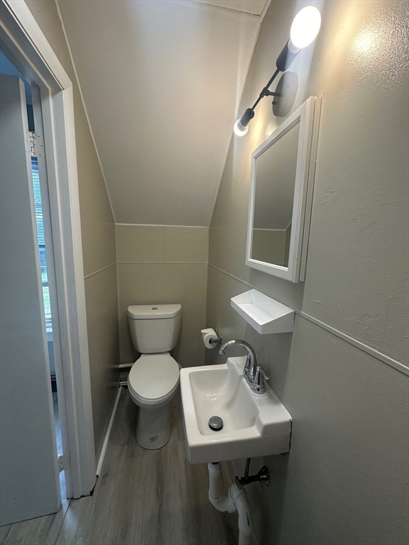27-29 Allen Street Gardner, MA 01440 - Photo 24 of 30 a bathroom with a toilet sink and mirror