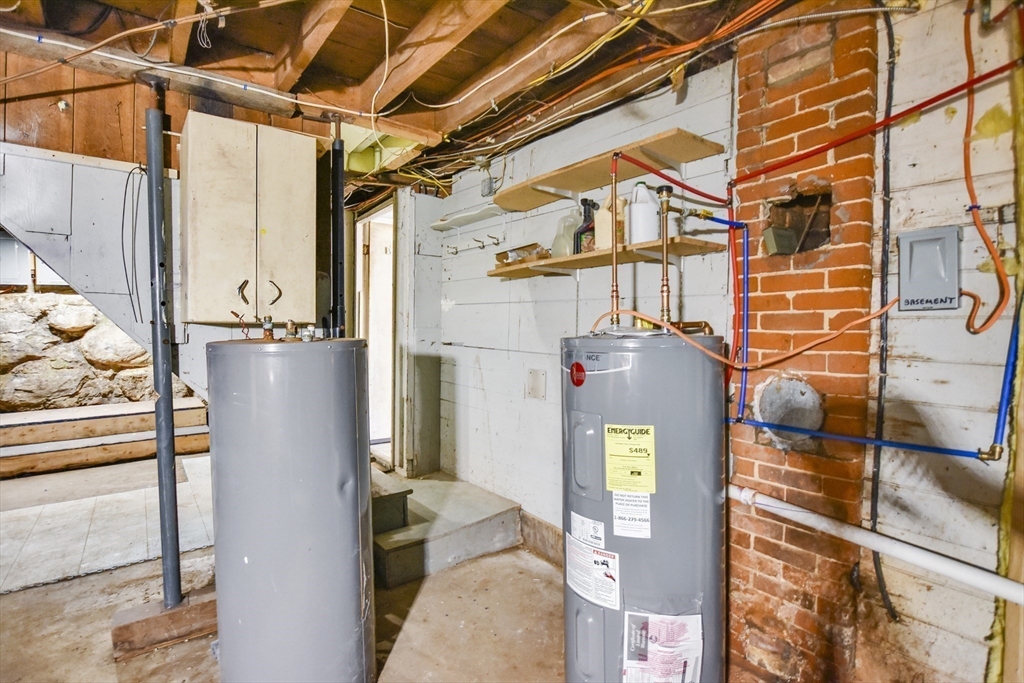 27-29 Allen Street Gardner, MA 01440 - Photo 26 of 30 a front view of a building with a glass door