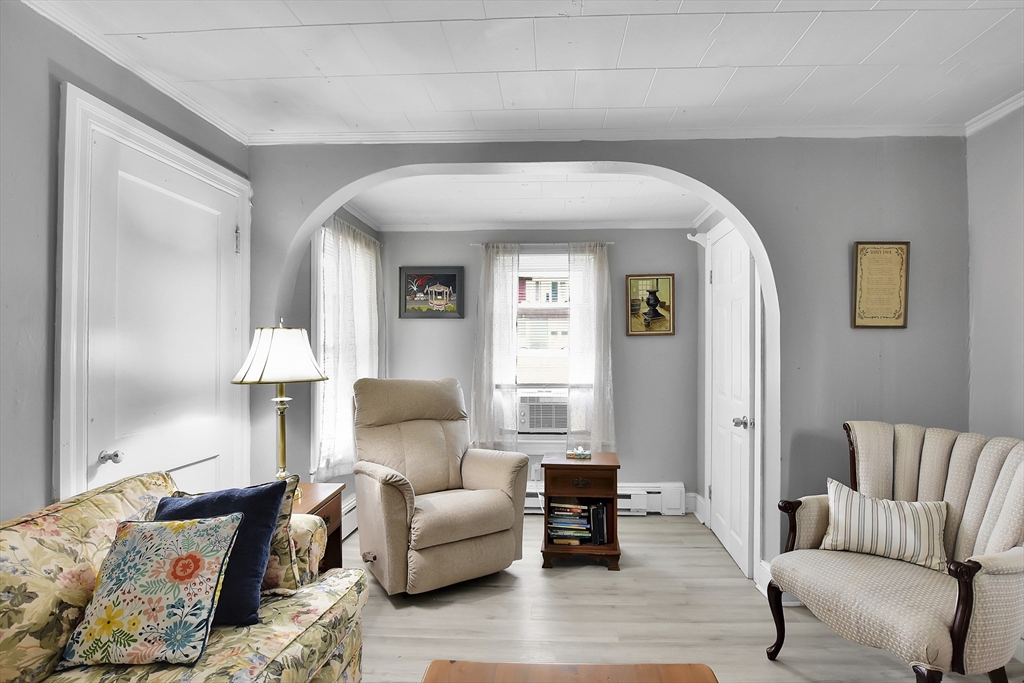 27-29 Allen Street Gardner, MA 01440 - Photo 4 of 30 a living room with furniture and a lamp