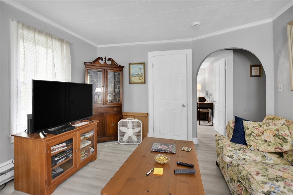 27-29 Allen Street Gardner, MA 01440 - Photo 6 of 30 a living room with furniture and a flat screen tv