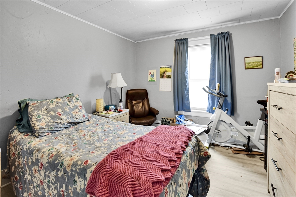 27-29 Allen Street Gardner, MA 01440 - Photo 7 of 30 a bedroom with two beds and a window