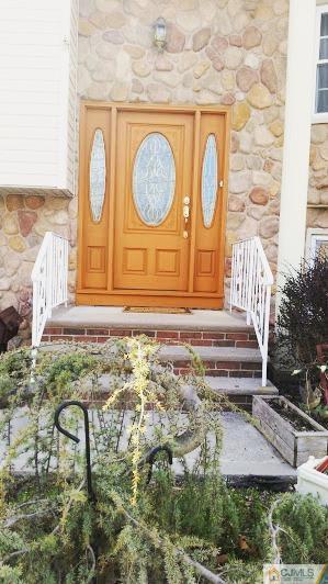 10 Hansen Road Old Bridge, NJ 08857 - Photo 2 of 24 a front view of a house with a garden
